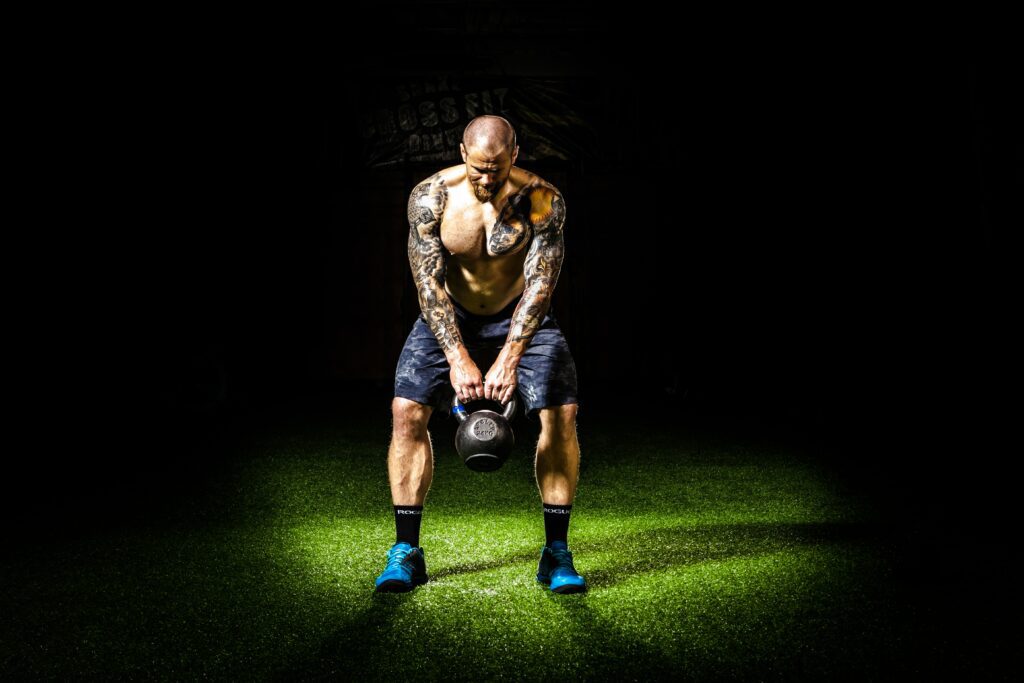 Man working out with kettlebell