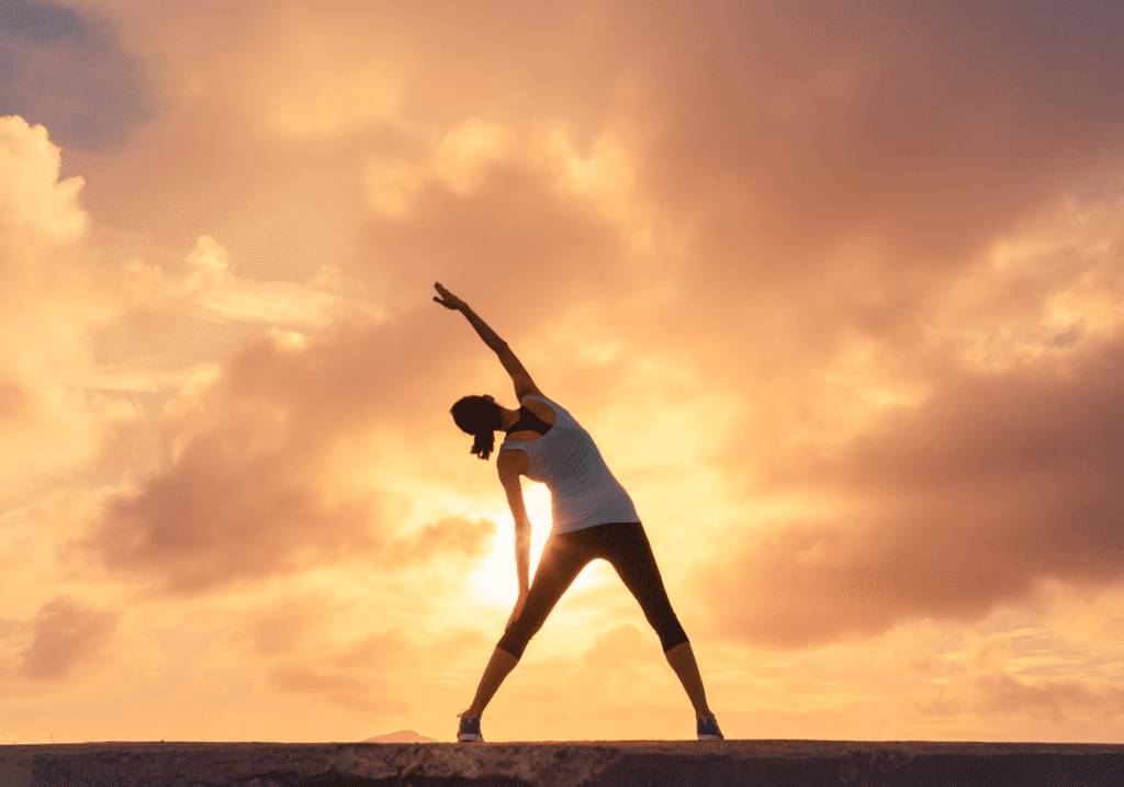 Woman stretching outdoors.